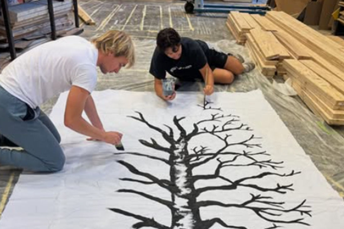 Photo of Students Painting for Outreach Projects