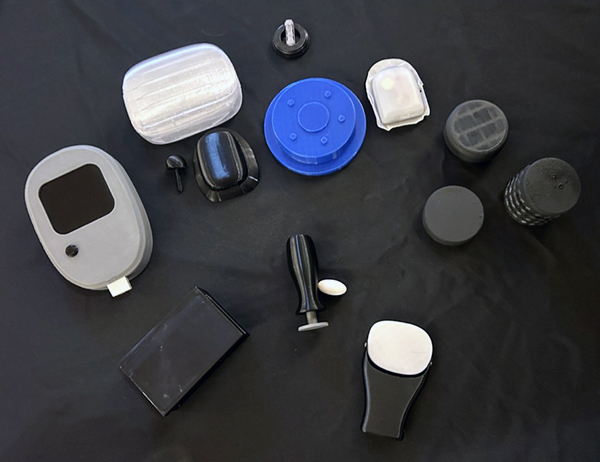 an array of 3d printed models of medical device prototypes